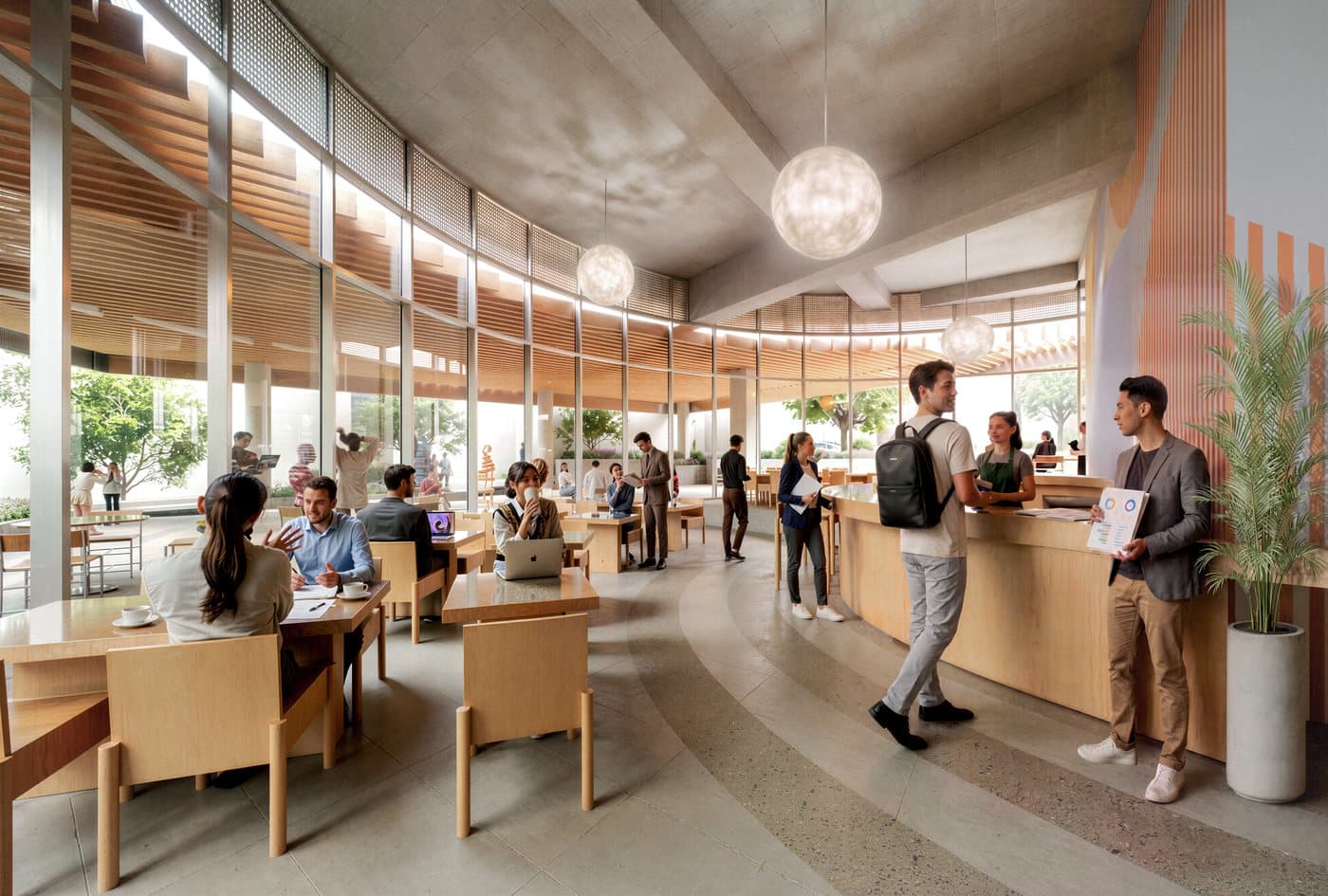 Ground-floor café opening onto the public plaza.
